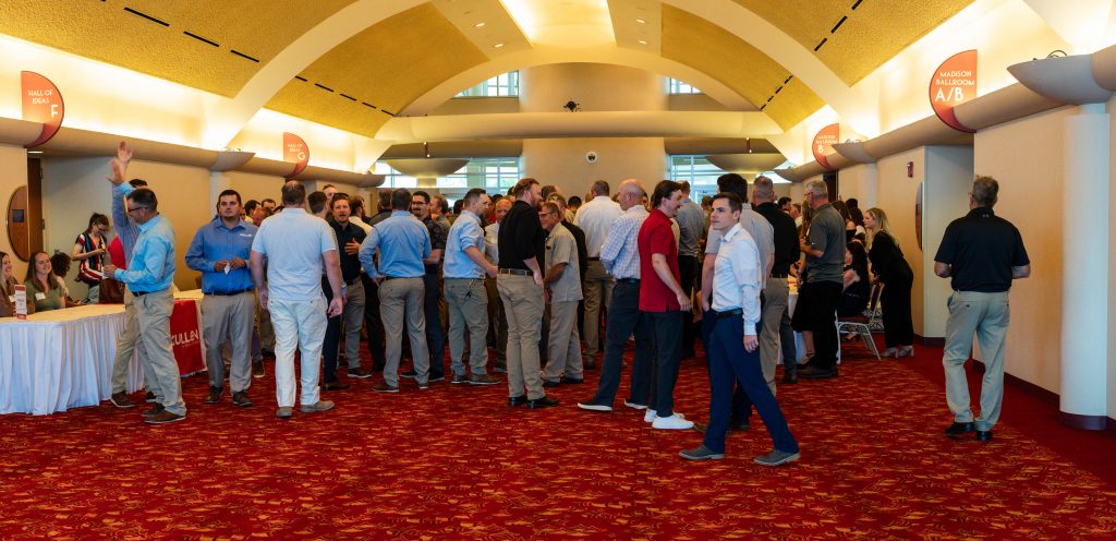 Crowd of people mingling at Monona Terrace